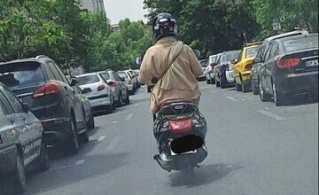 تصویر موتورسواری یک زن چادری که پربازدید شد